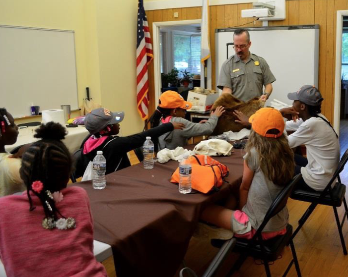 Students from the Boys & Girls Club of North Ridge Crossing learn about local wild life at Big South Fork National River and Recreation Area.